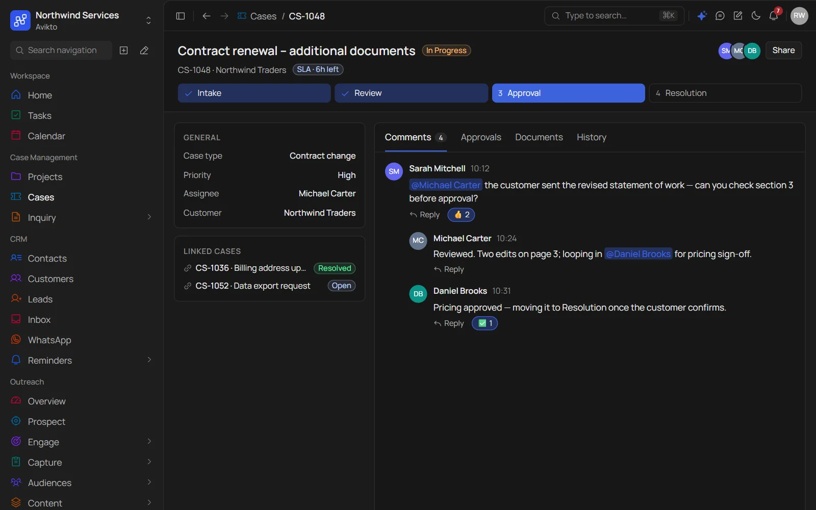 Avikto case record with a comment thread, @mentions, reactions and linked cases